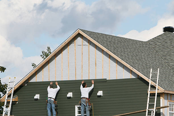 Professional Siding Contractor technician working in Canton, OH